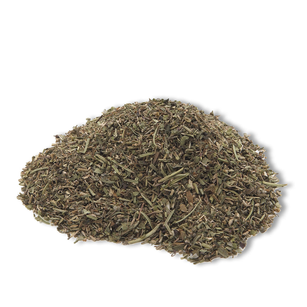 Pile of dried Herbes de Provence spice mix on a white background