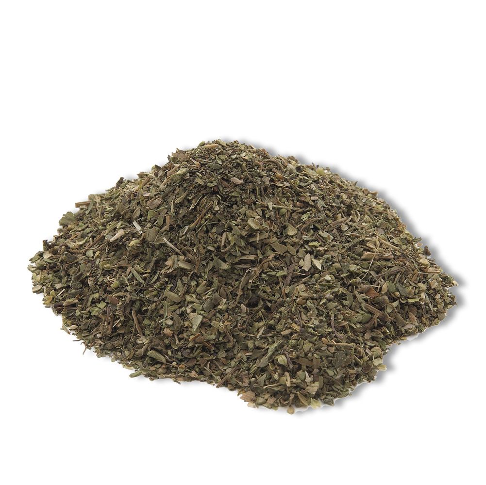 Pile of dried pizza seasoning herbs in green flakes